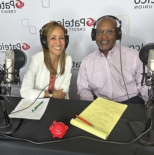 Patelco employees Michele Enriquez and Fred Williams at the podcast desk
